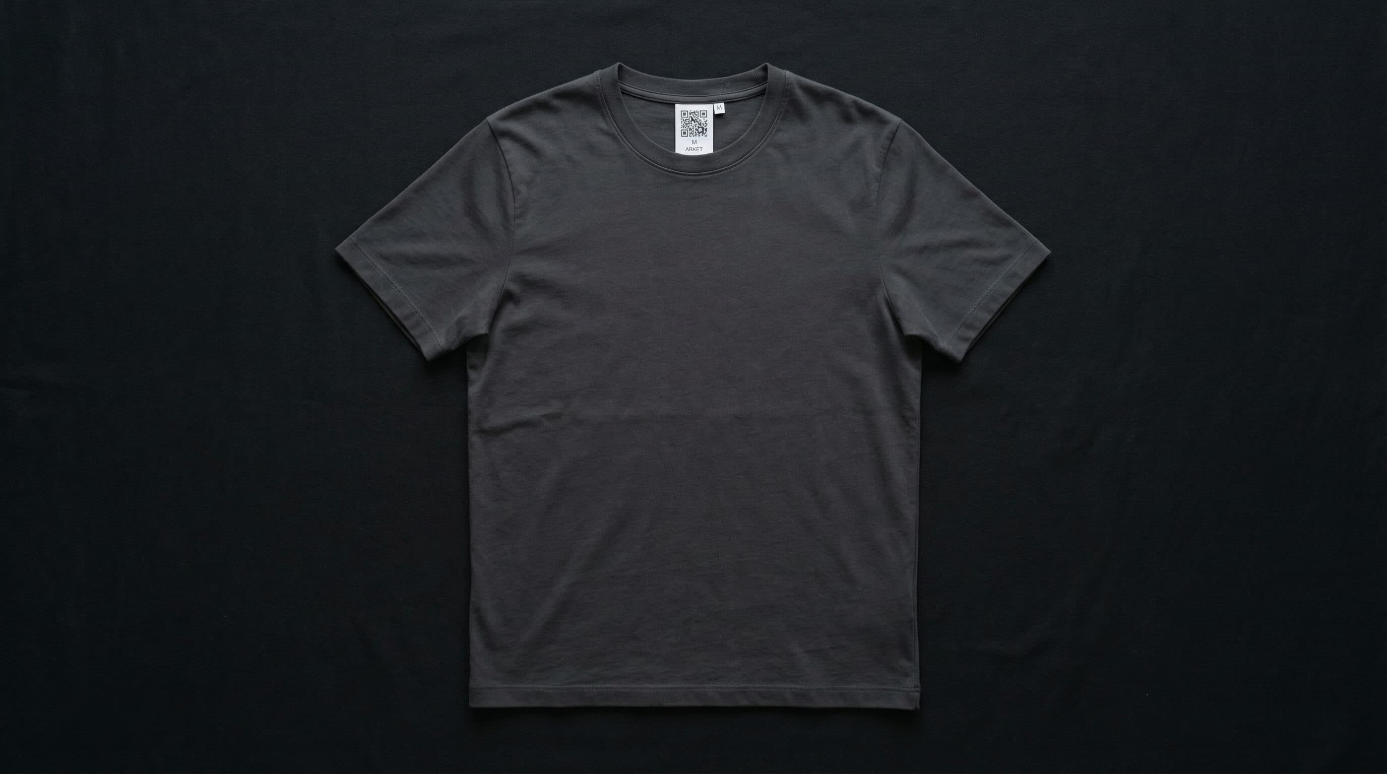 Dark charcoal developer t-shirt with Digital Product Passport QR label — sustainable coding clothing by ByteWear